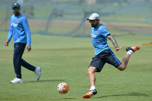 Cricketers Play Football